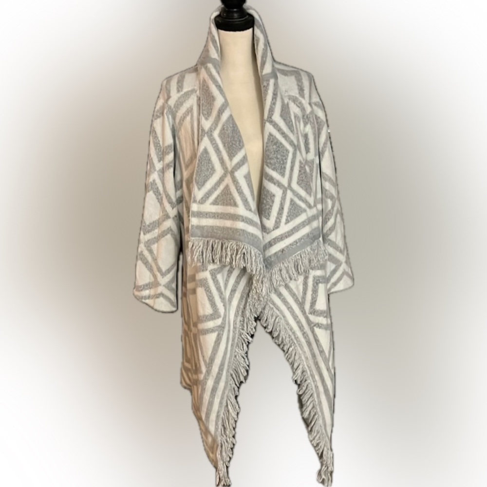Beautiful shawl poncho style with arm sleeves